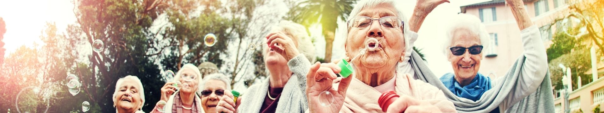 old ladies blowing bubbles