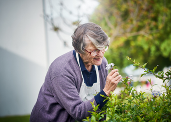 elderly woman gardening